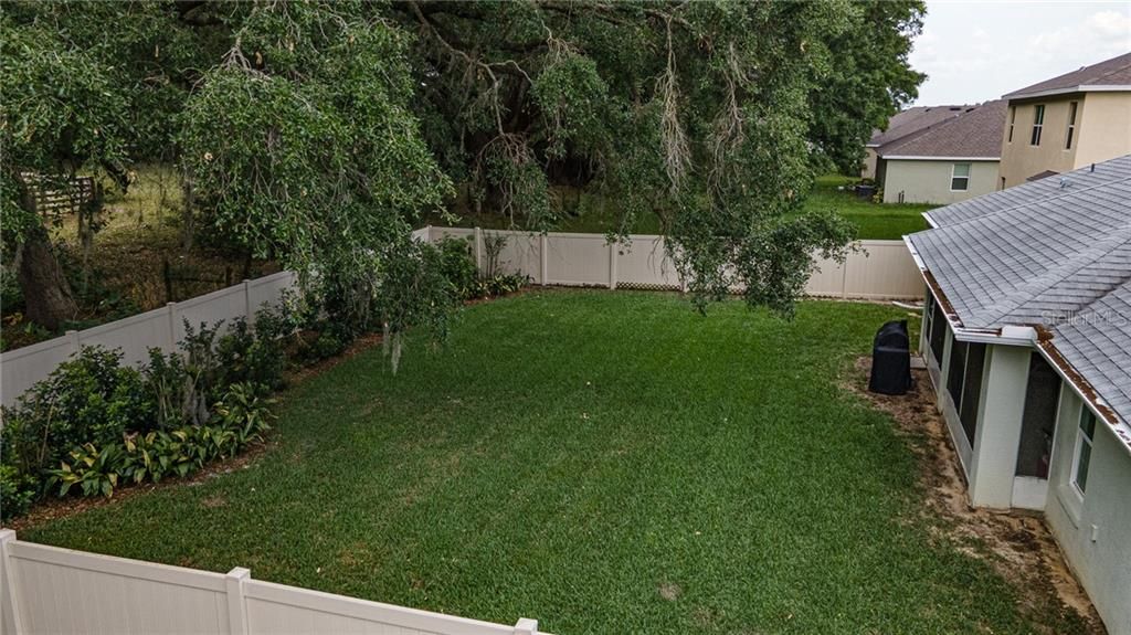 beautiful back yard for your pets or kids. Already privacy fenced for added security.
