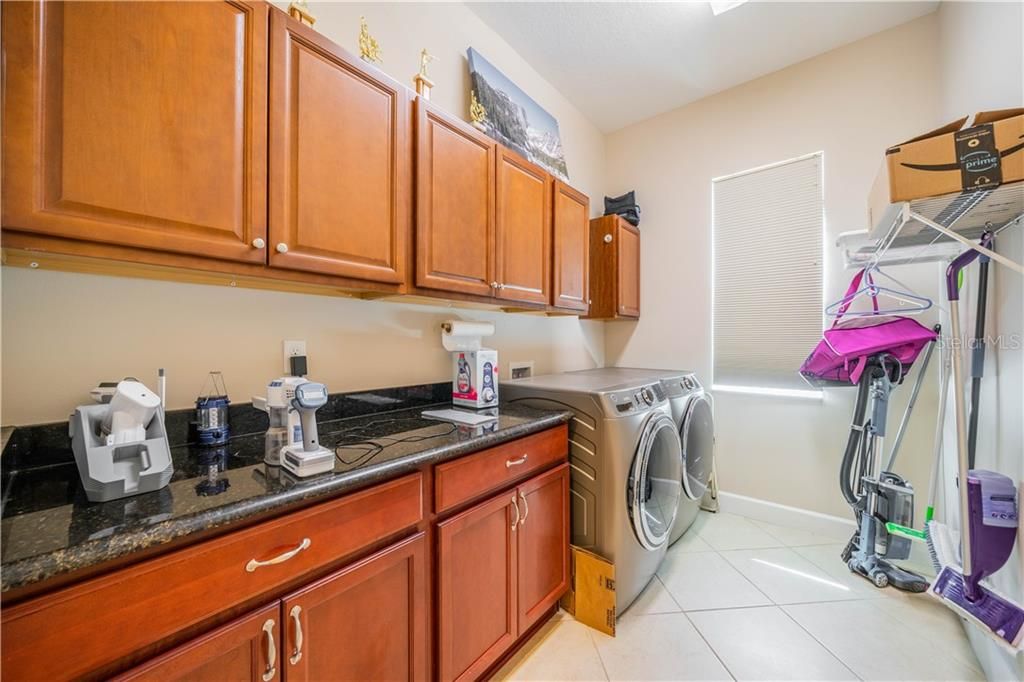 Large Laundry with extra storage and long counter