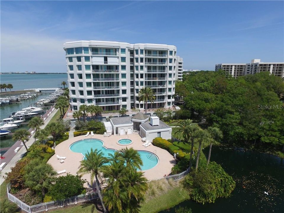 One Seaside Lane #201 Waterfront view of the intercostal and the Pool Lush landscaping!