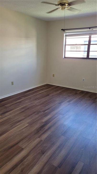 Bedroom with luxury plank vinyl floors