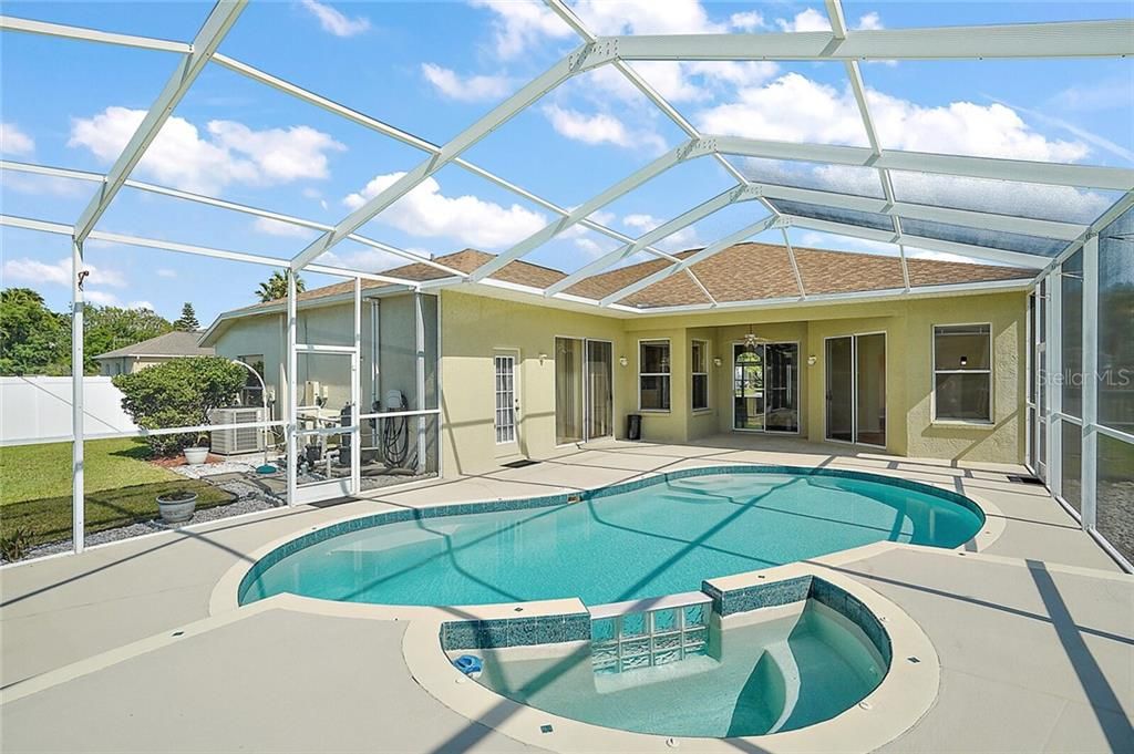 This spacious Pool Decking allows you plenty of room to entertain your guests, and has easy access to the Pool Bath plus Sliders to your Family Room, Living Room and Flex Room (located adjacent to the Master Suite).