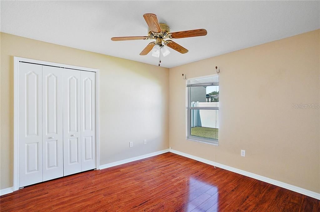 3rd Bedroom - 11X11 - is another spacious bedroom with laminate flooring and a light, bright wall color.