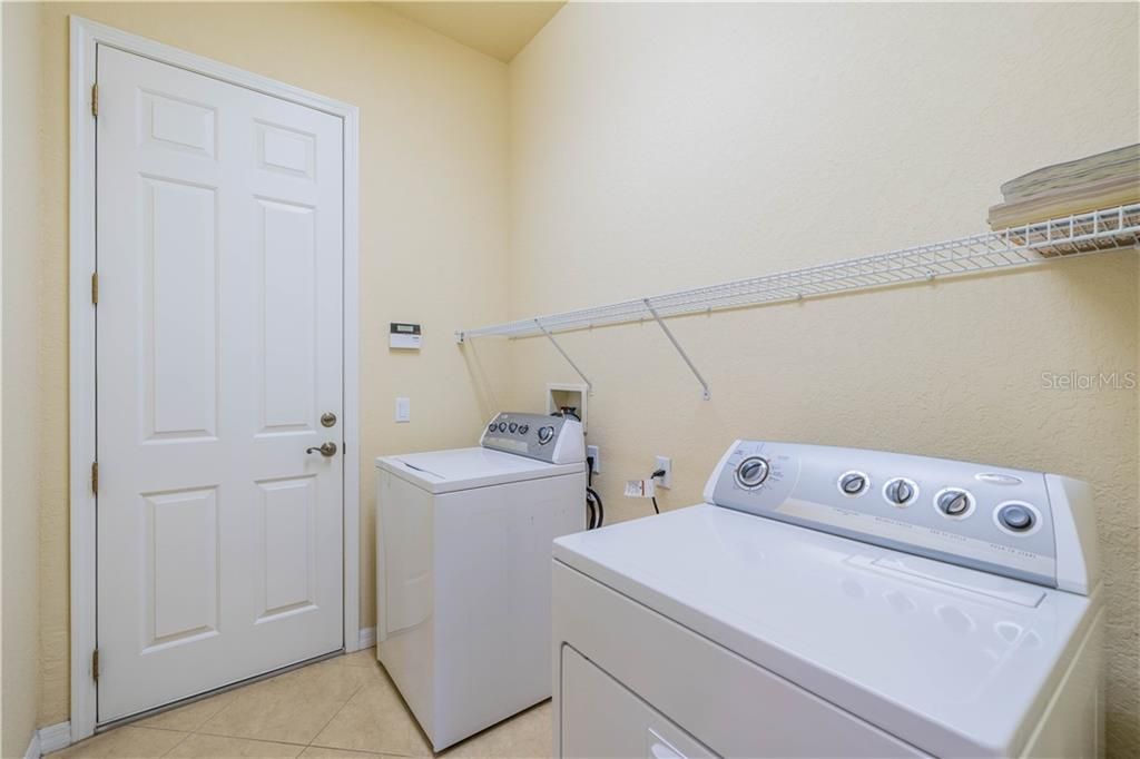 Laundry Room and access to the Garage