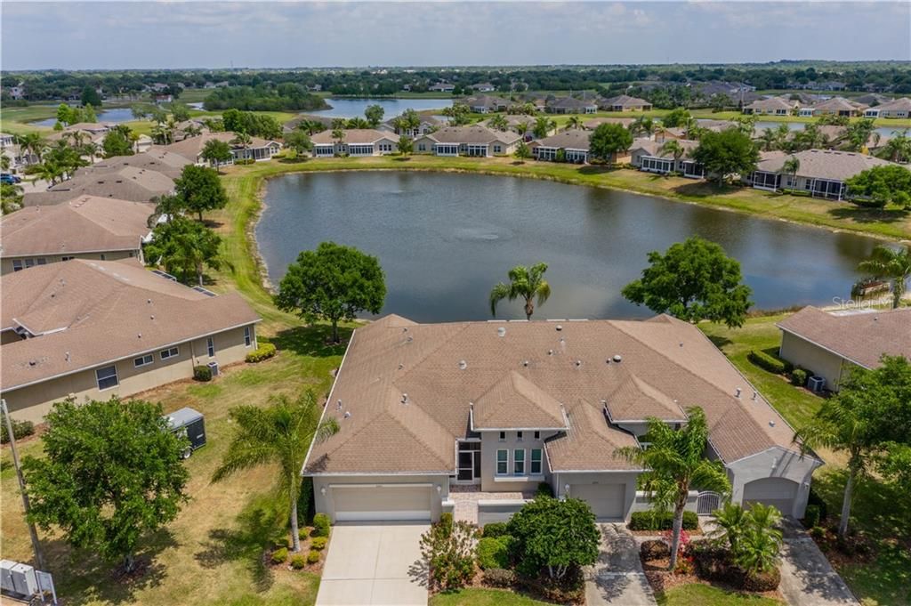 High Drone View of the property and the whole pond and other scenic views beyond