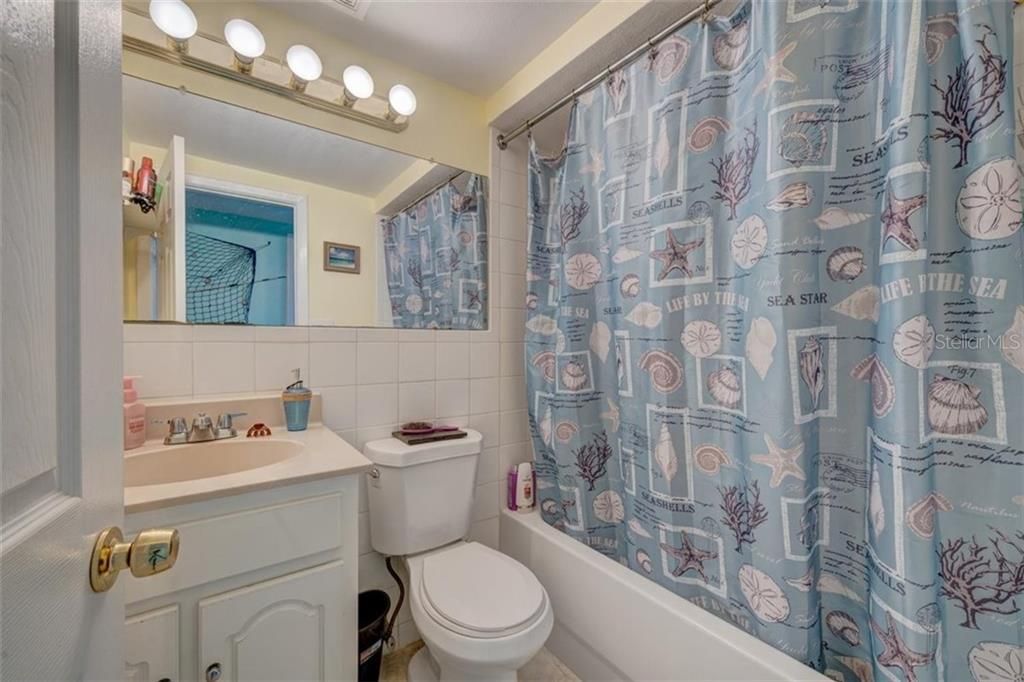 Tenant occupied unit - north unit, marked 12627 - bathroom 1 on first floor
