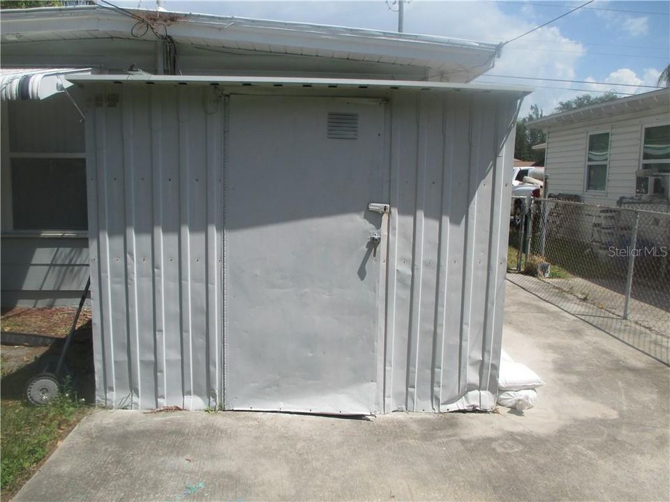 STORAGE SHED-AS IS