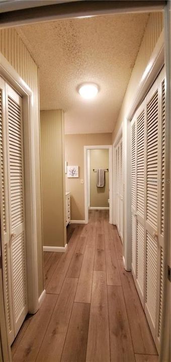 NEW VINYL PLANK FLOORING FROM MASTER BEDROOM ALL THE WAY TO THE BATHROOM AREA.   DOUBLE CLOSETS WITH LIGHTS ON RIGH SIDE. LINEN ON LEFT