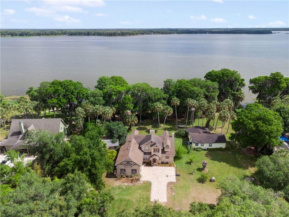 Sited on 8+ Acres and offering 225 feet of Lake Frontage to Lake Pierce