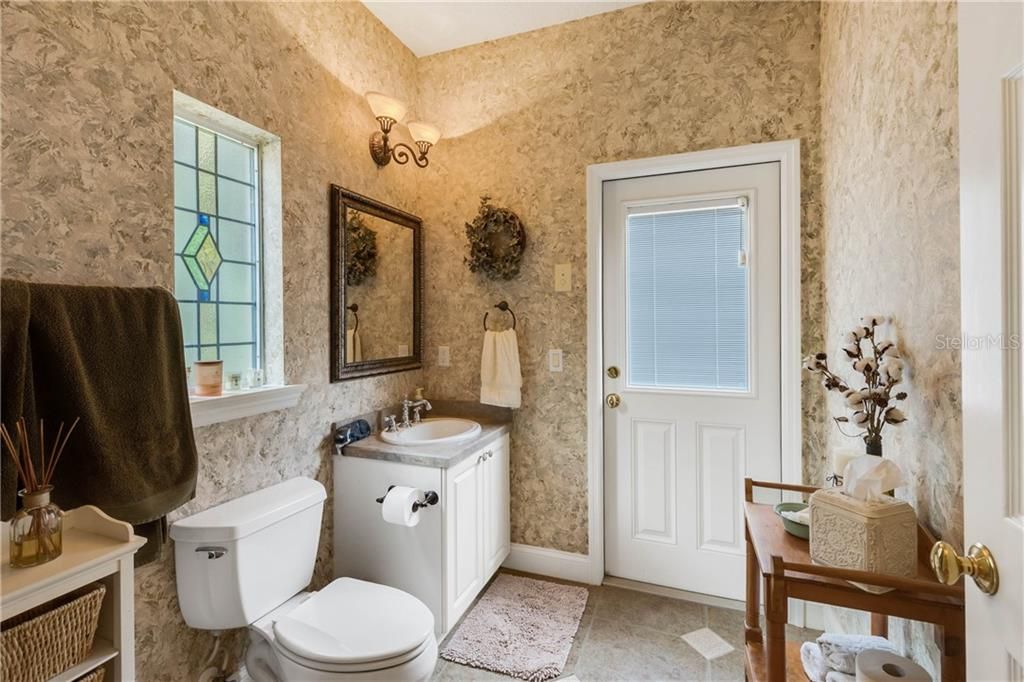1st Floor Bathroom with Direct Access to the Backyard