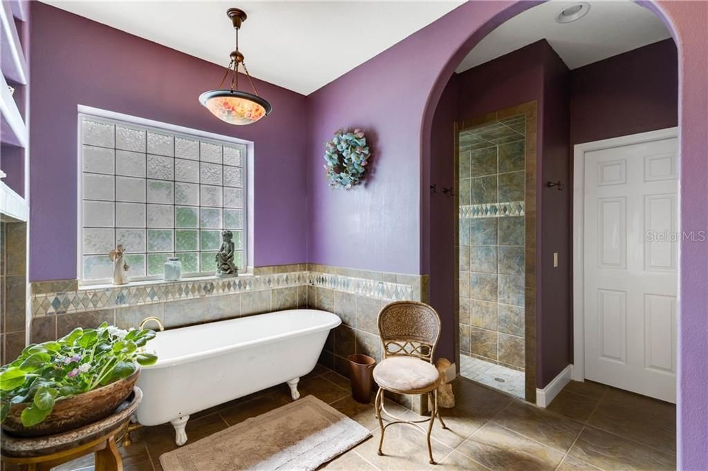 Claw Foot Tub & Walk in Shower amenities located in the Master Bathroom