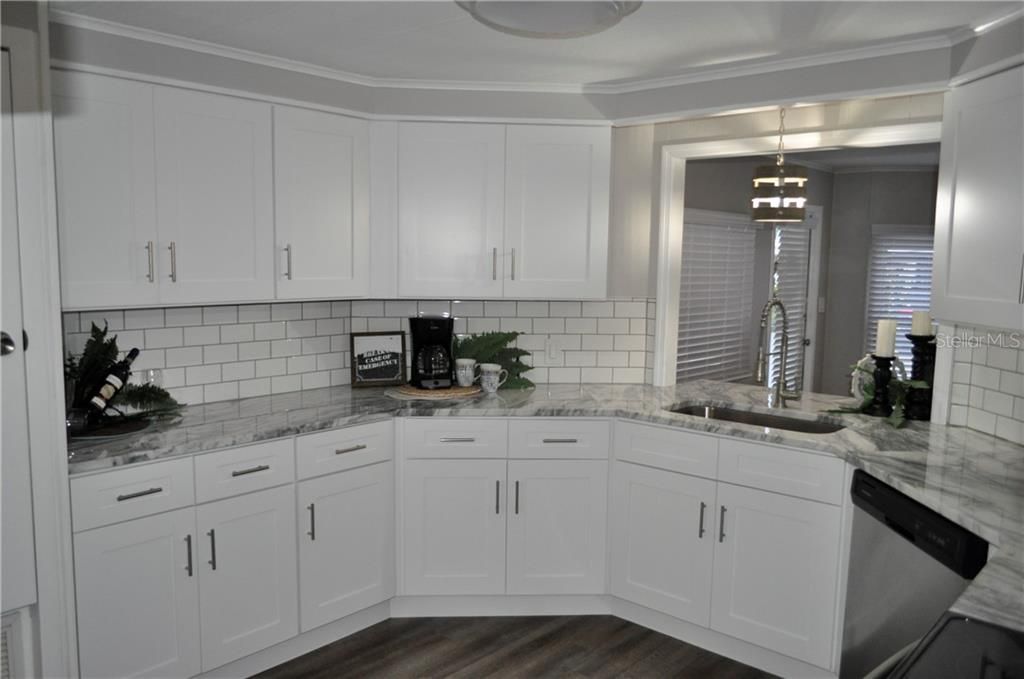 Kitchen (New Appliances, counters, cabinets, flooring, GFI outlets, sink, faucet, backsplash, paint & fixtures)