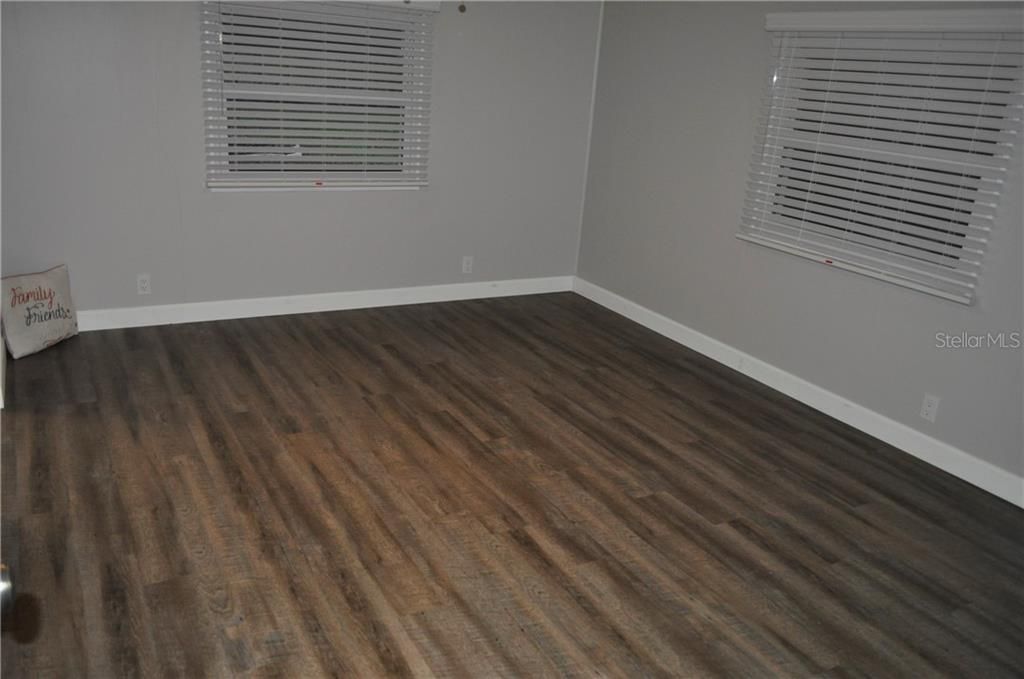 Master Bedroom (New Flooring, Paint, Ceiling Fan & Blinds)