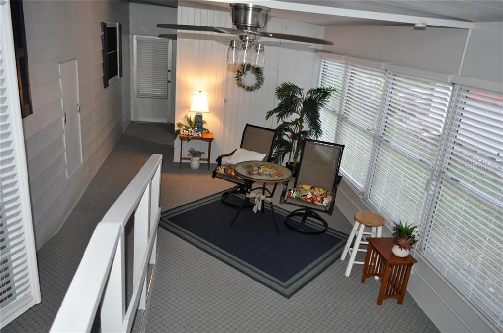 Florida/Sun Room (New Paint, Ceiling Fan, Blinds, carpet, GFI outlet, Paint & screens)
