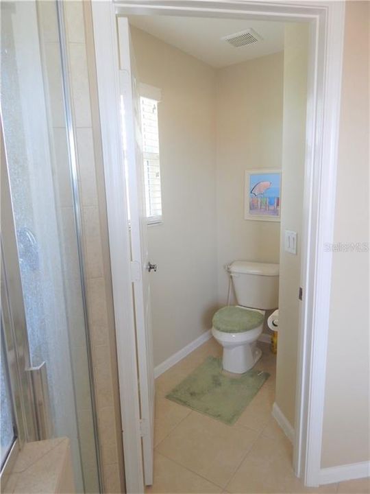 Master Bathroom enclosed toilet