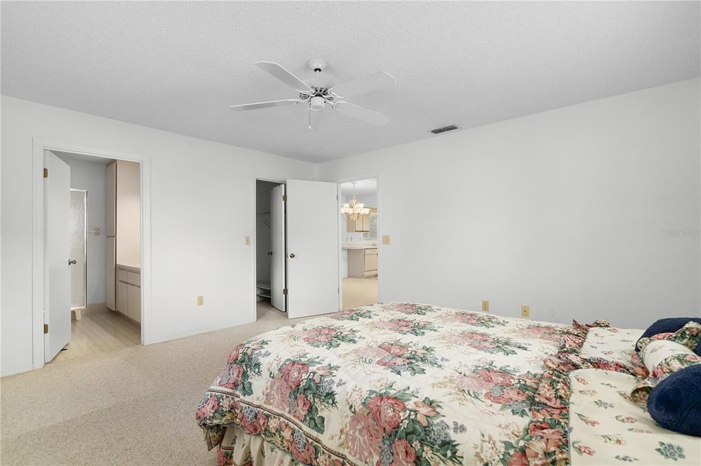 Master Bedroom. Ceiling Fan, carpet flooring and WALK-IN closet.