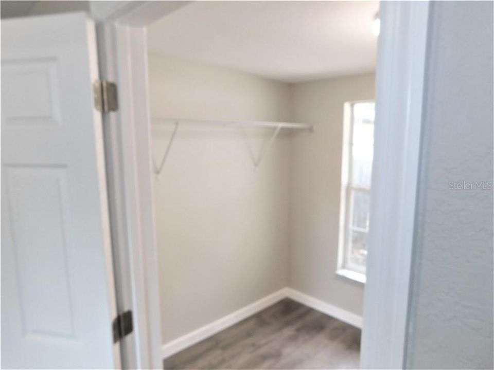 master bedroom walk in closet with a window!
