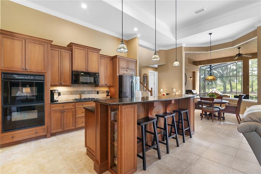 Gourmet kitchen with gas cooktop, built in oven with convection microwave & new refrigerator.