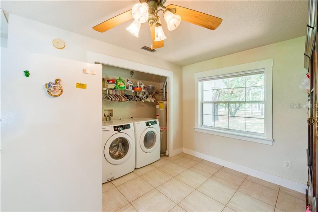 Laundry room/extra storage space (12x10)