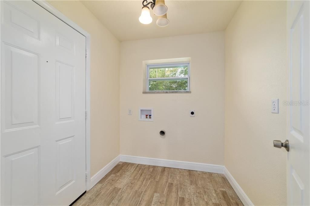 laundry room leads to garage
