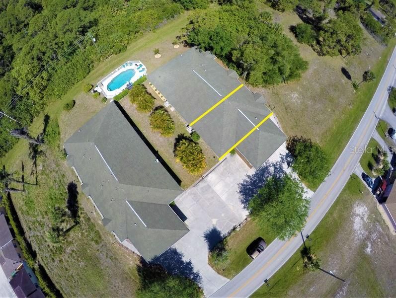 good drone image showing the 2 building pool  parking and size yard