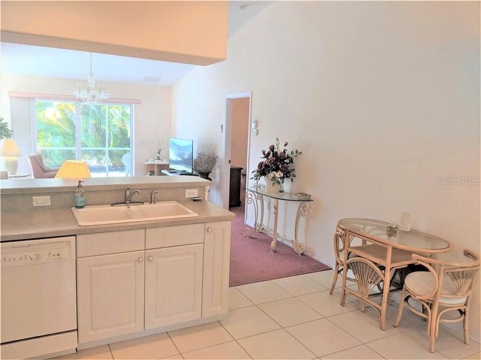 Breakfast nook, is tiled and conveniently closed to the open kitchen