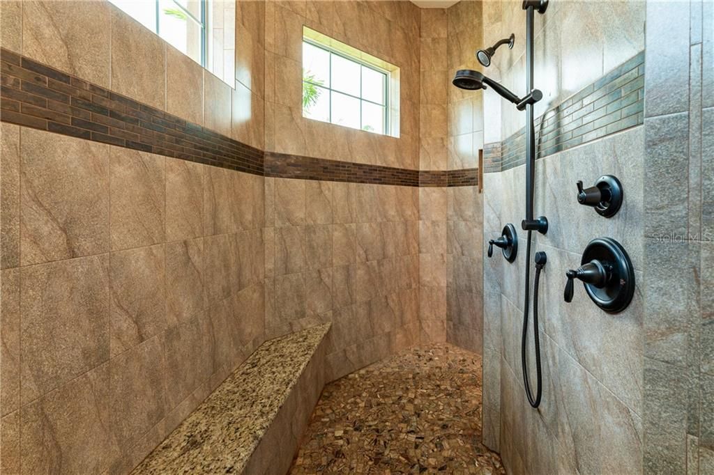 Large Roman shower in Master bath.