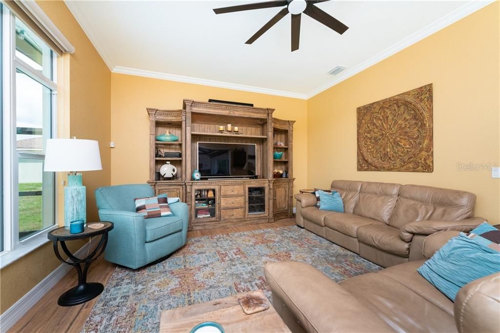 This is the second of two living areas in the home...a great media room with sliders leading directly to the pool/lanai to gracefully combine the indoor/outdoor living areas.