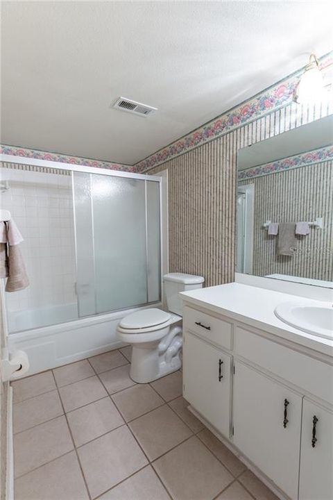 This is the 2nd remodeled bathroom located off the hallway across from the 2nd bedroom.  This bath offers a tub and shower.