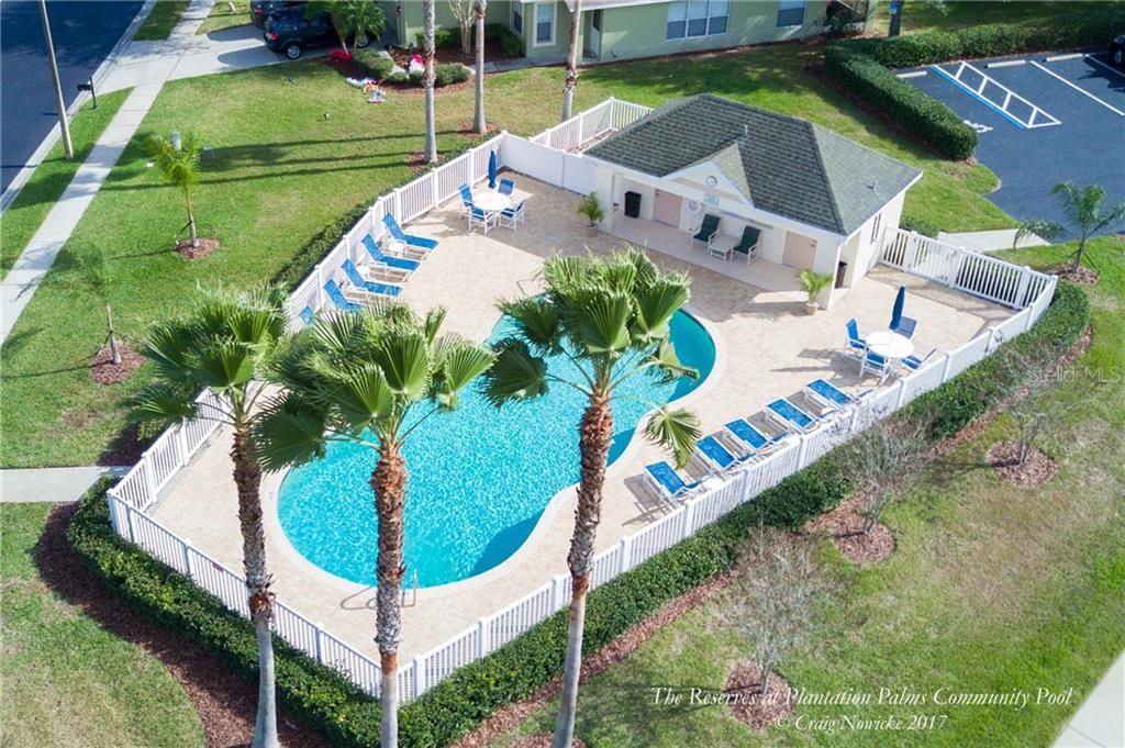 This home is steps away from the community pool that is for use of the residents of THE RESERVE at Plantation Palms...
