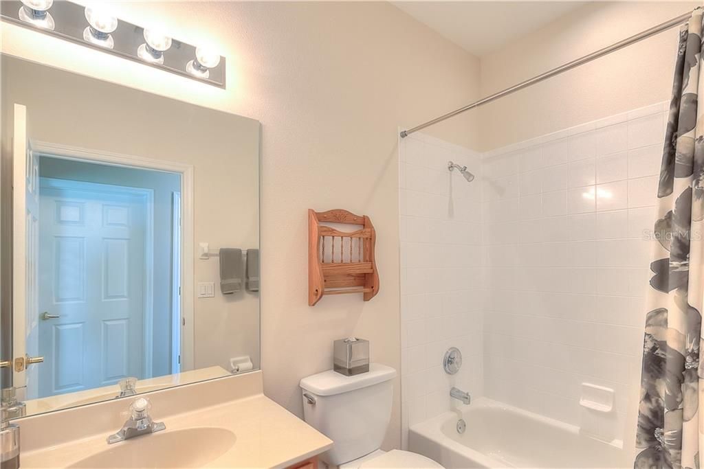 Guest Bath #2 has a tub/shower combo & tile enclosure!
