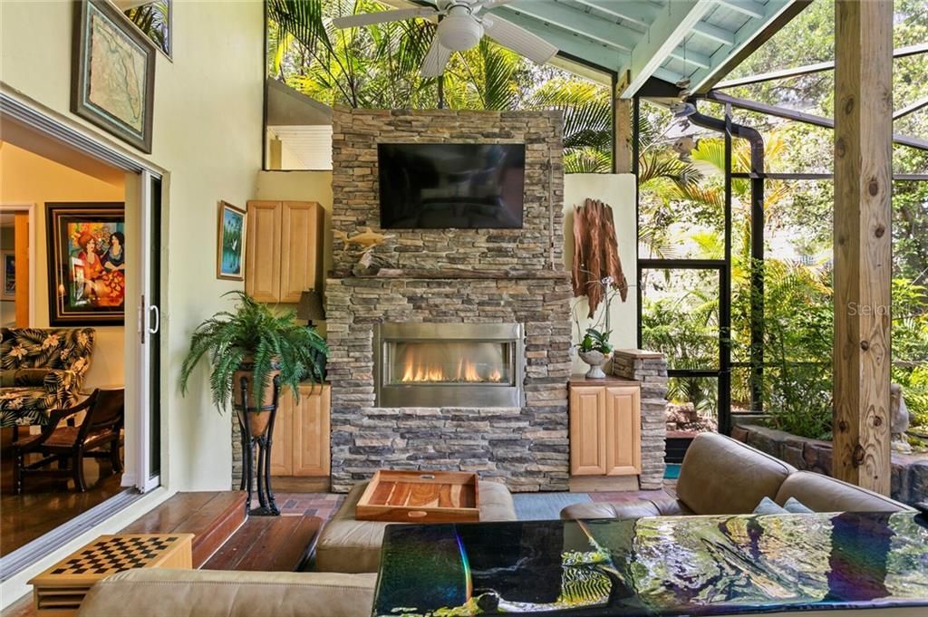 The stacked stone gas fireplace & TV make for a beautiful accent wall