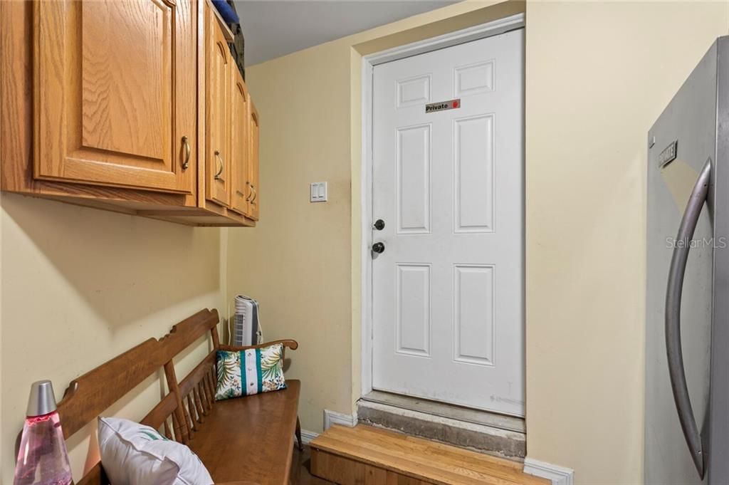 The office connects to a mudroom / touchdown area that leads out to the 3+ car garage