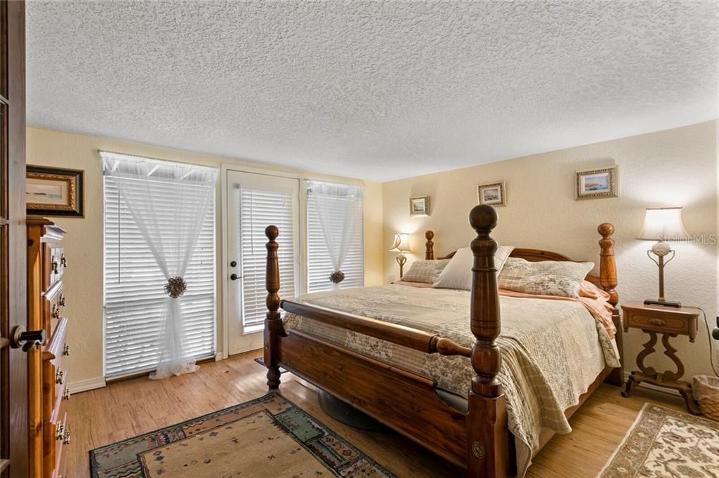 Bedroom 3 in the middle has a door that leads out to a private screened lanai