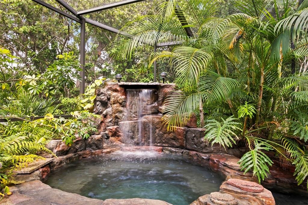 The multi-tiered waterfall completes the heated spa experience