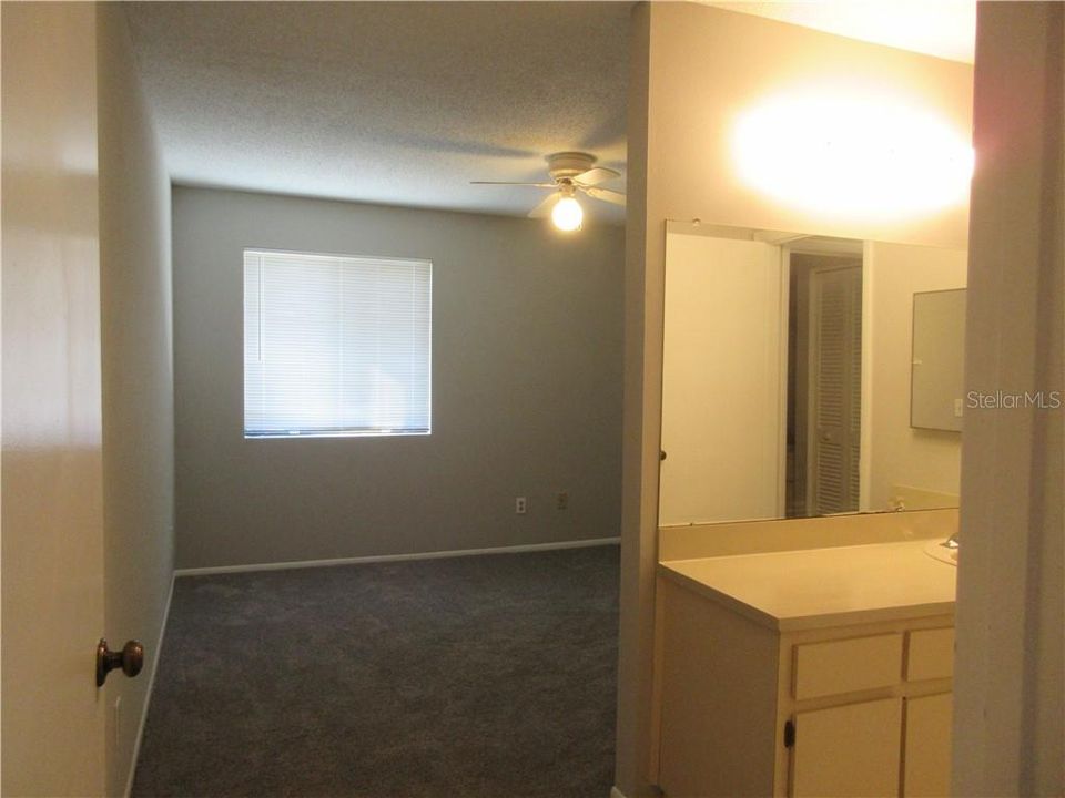 Master bedroom at rear with private vanity area