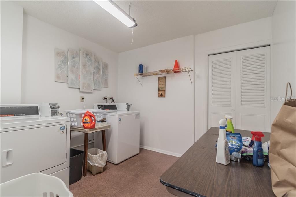 Laundry room located right next to unit