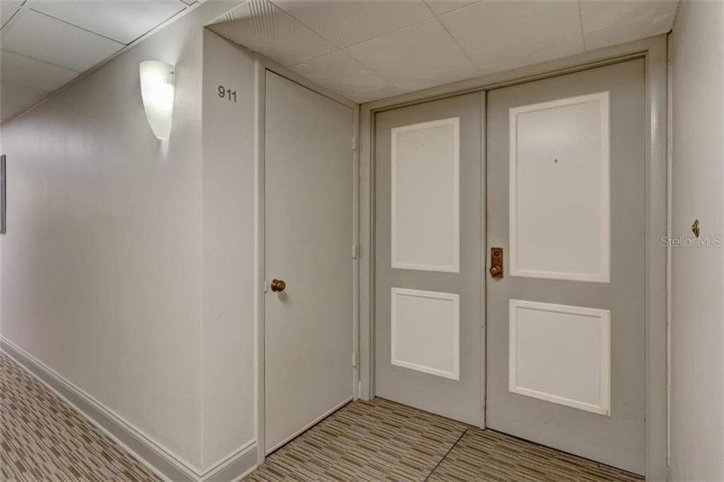 Unit entrance - door on left is access to the AC unit
