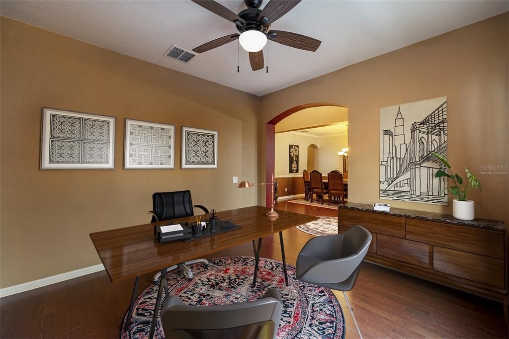 Virtually staged:  This room may be used as an office, library, or formal living room.