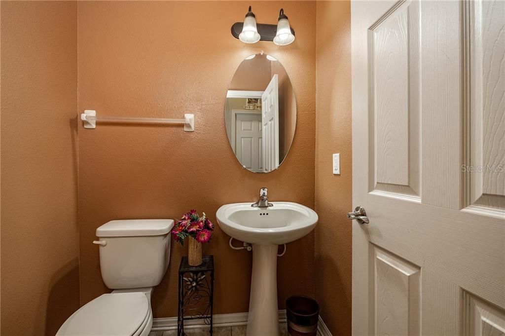 Powder bath downstairs is located near formal areas - perfect for guests!