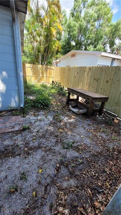 Side yard with newer fence