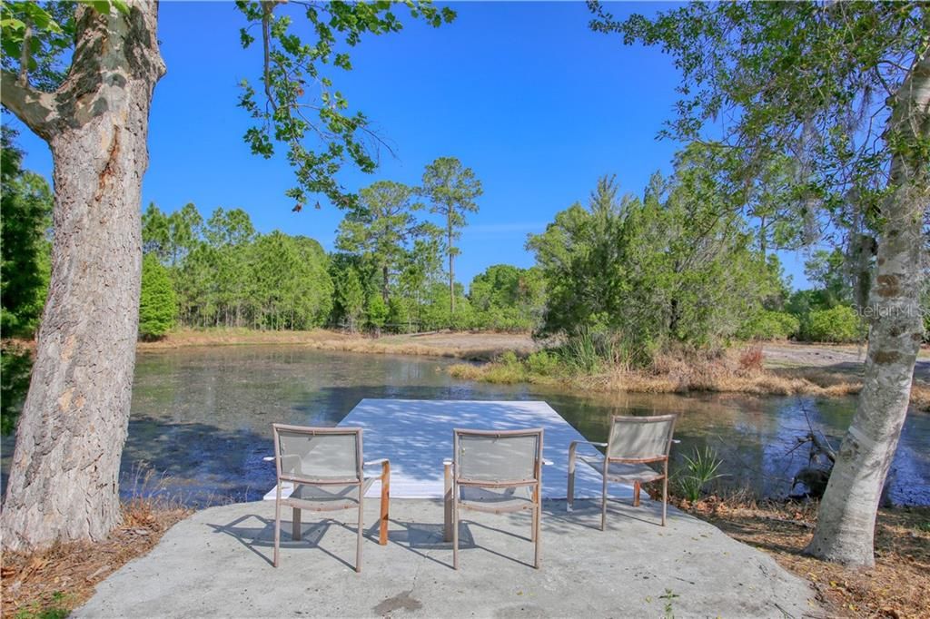 Concrete pad and composite dock/fishing pier