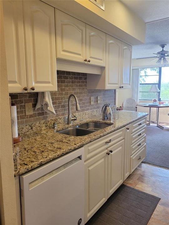 Kitchen has granite counter top and LOTS of counter space!