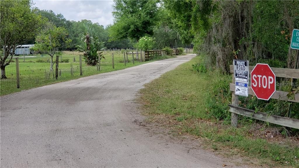 Private road. 5 acre parcel is just in and on left. Look for sign marking the first corner.