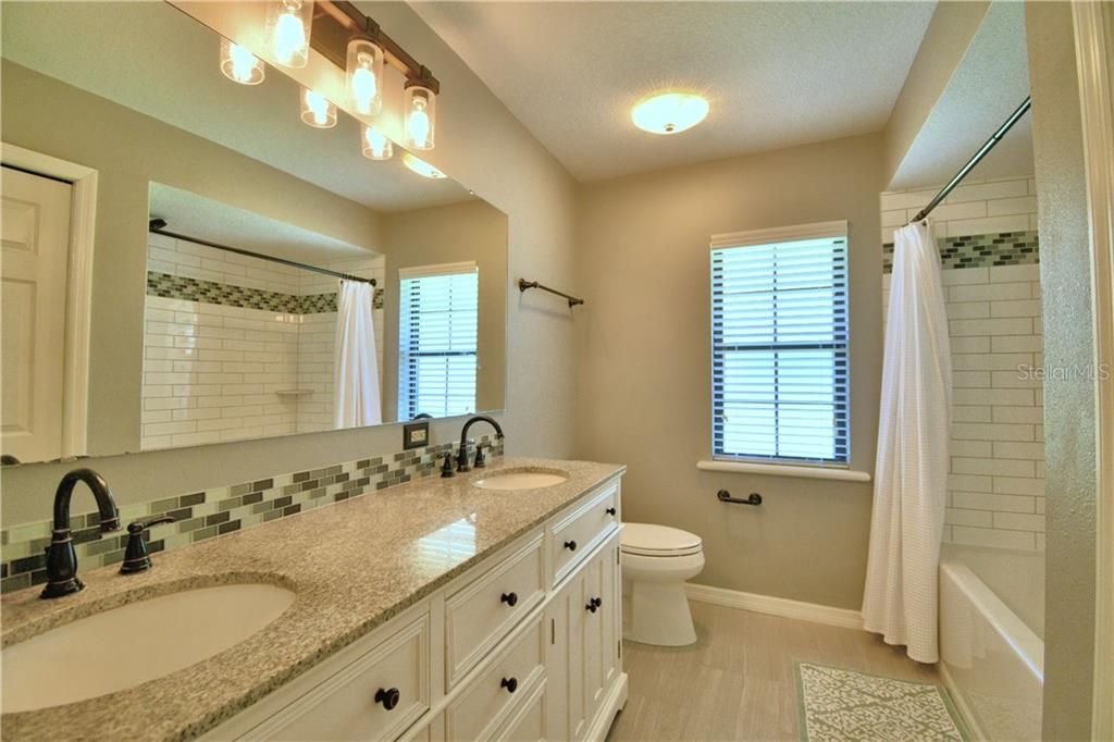 hall bathroom between 3rd and 4th bedrooms