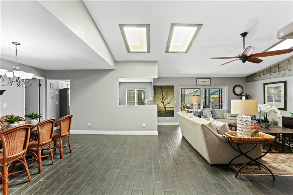 Vaulted ceilings and skylights enhance the space.