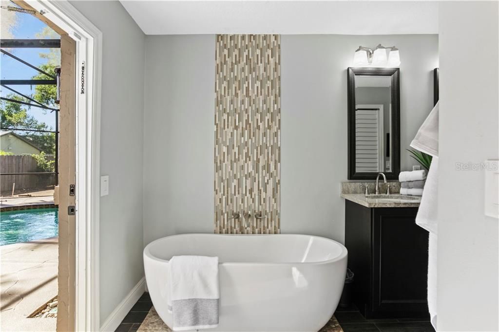 Elegant free-standing soaking tub.