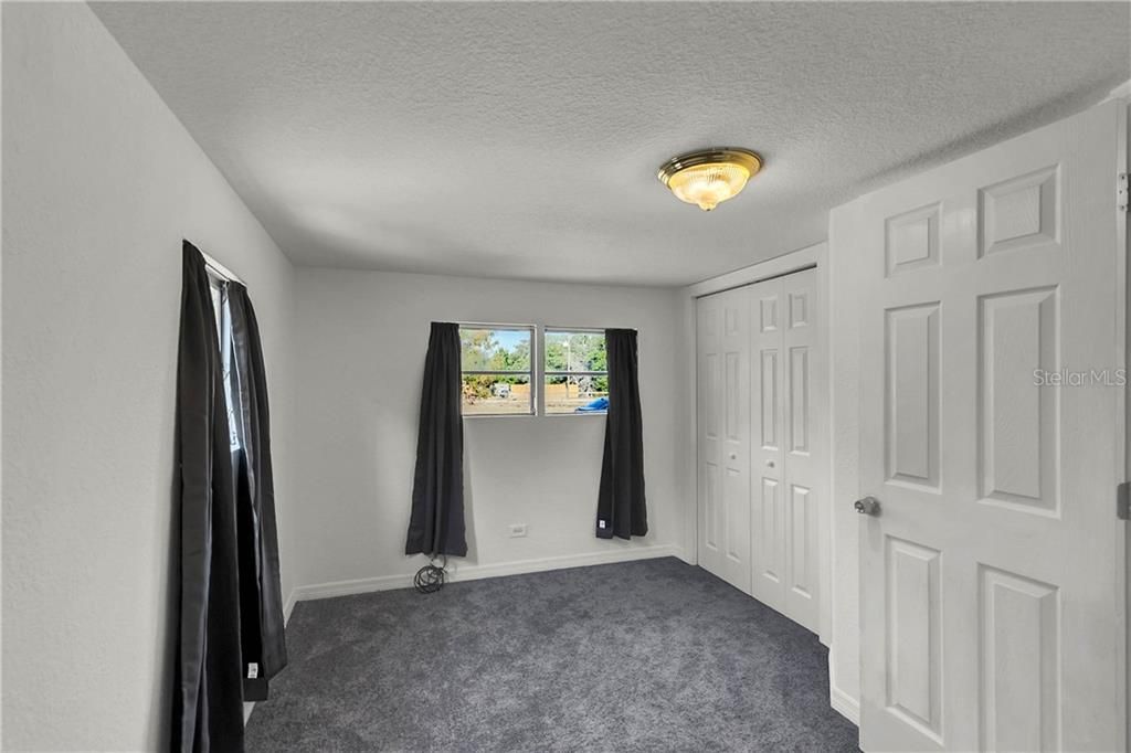 Master Bedroom with New Lighting and New Carpet