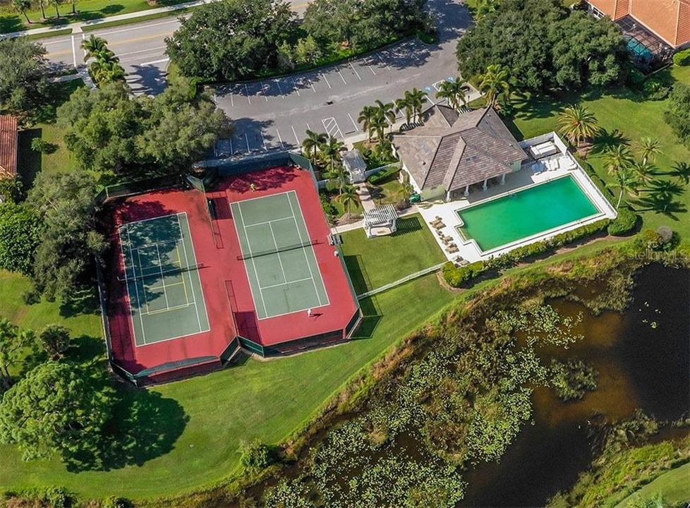 Aerial view of the Clubhouse, pool and tennis courts.