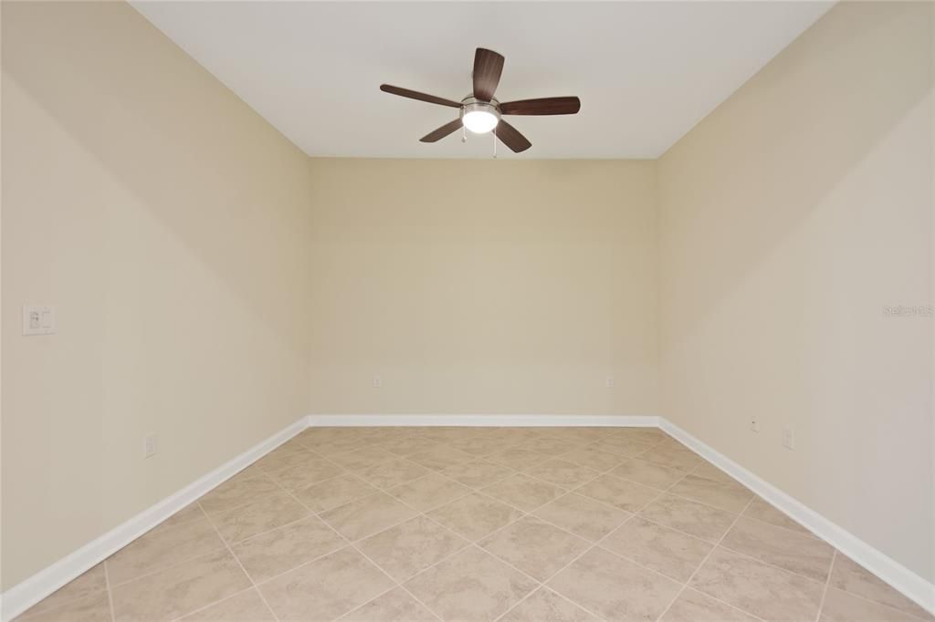 This room can be use as a office/ family room or dining room