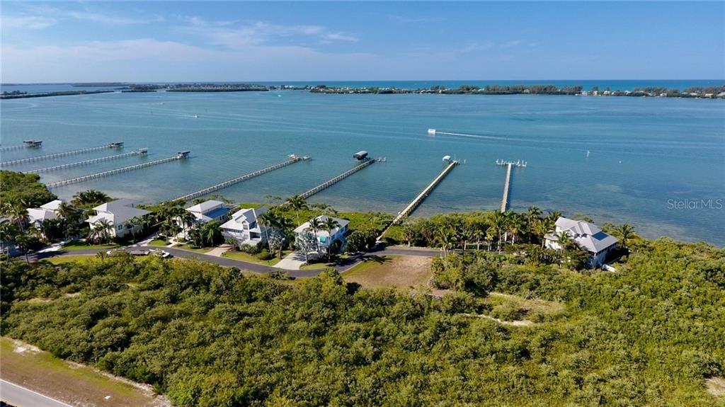 Beautiful waterfront lot over 1 acre in size, with direct water views and pivate boat dock.